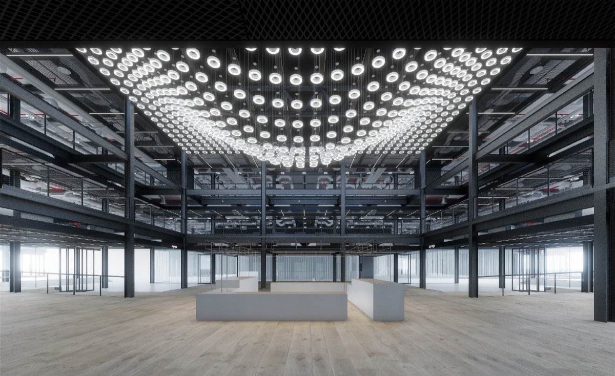 The finished Broadgate lighting feature: hundreds of suspended ring lamps forming a rippled canopy in an atrium